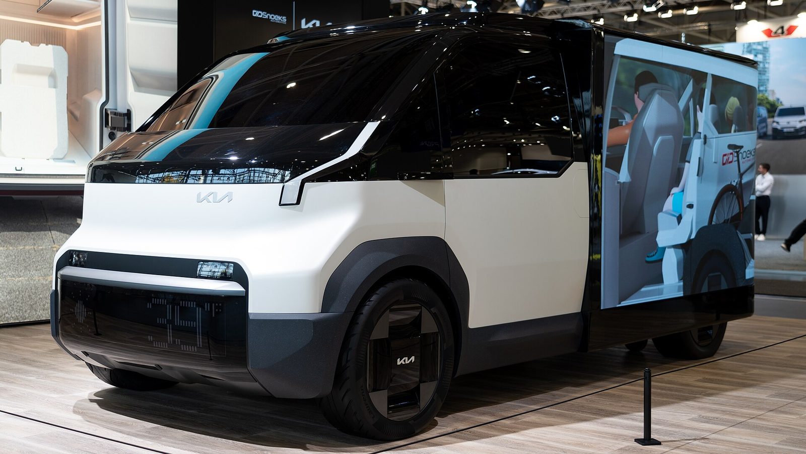 Kia PV5 — photo by MarcelX42, CC BY-SA 4.0, via Wikimedia Commons